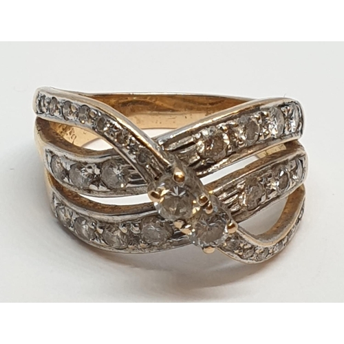 132 - 18ct Yellow gold diamond set fancy three row twist band ring. Weight 8.5g, Approx. 0.60ct of diamond... 