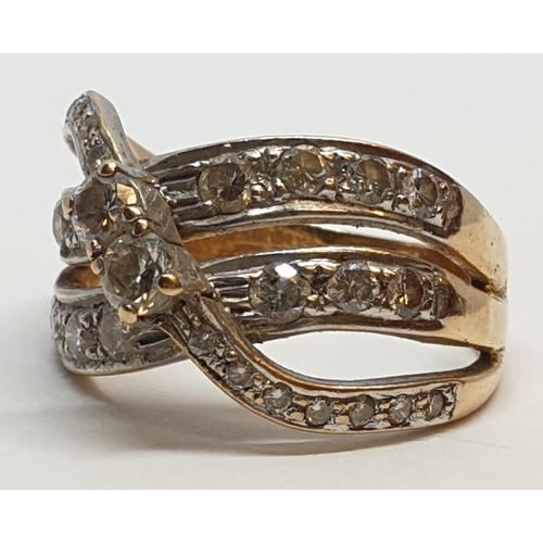 132 - 18ct Yellow gold diamond set fancy three row twist band ring. Weight 8.5g, Approx. 0.60ct of diamond... 