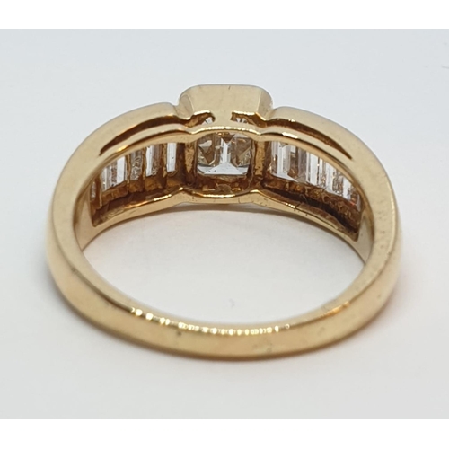 152 - Yellow gold ring with baguette cut diamonds, centre stone 0.85ct and further 0.50ct diamonds on each... 