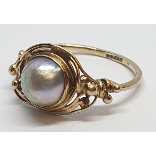 176 - 9ct Yellow gold cultured pearl set ring. Weight 2g, Size L.