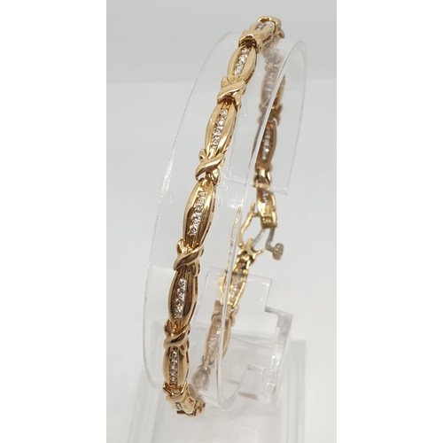 34 - 18ct Yellow gold set bracelet. Approx. 0.75ct of diamond. Weight 11.7g, Length 19cm.