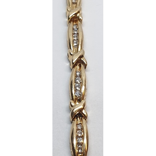 34 - 18ct Yellow gold set bracelet. Approx. 0.75ct of diamond. Weight 11.7g, Length 19cm.