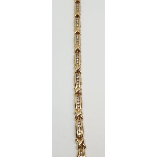 34 - 18ct Yellow gold set bracelet. Approx. 0.75ct of diamond. Weight 11.7g, Length 19cm.