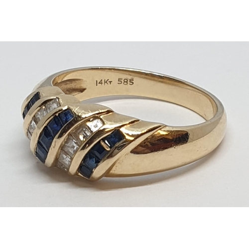 38 - 14ct Yellow gold diamond and sapphire ring. Weight 4.2g, Size N.