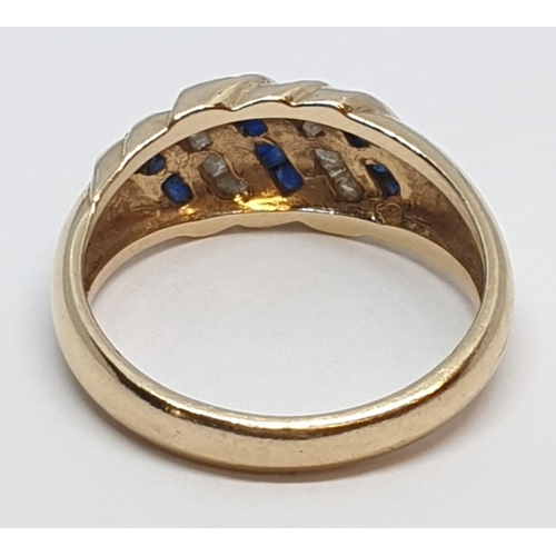 38 - 14ct Yellow gold diamond and sapphire ring. Weight 4.2g, Size N.