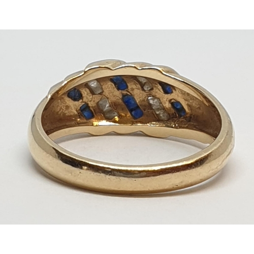 38 - 14ct Yellow gold diamond and sapphire ring. Weight 4.2g, Size N.