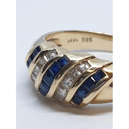 38 - 14ct Yellow gold diamond and sapphire ring. Weight 4.2g, Size N.