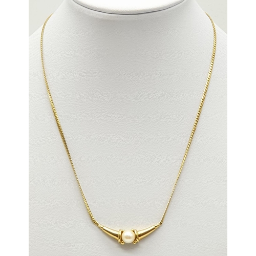 57 - 18ct Yellow gold collar necklace with a cultured pearl set. Weight 8.3g, Length 7.7cm.