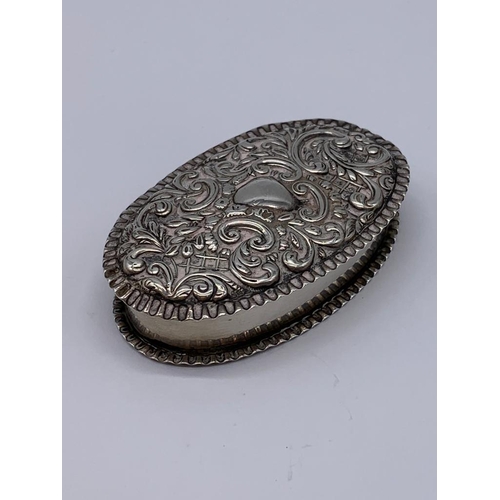 151 - Antique silver snuff box in oval repousse form. Hallmarked Adie & Lovekin, Birmingham 1900.  Lid fit... 