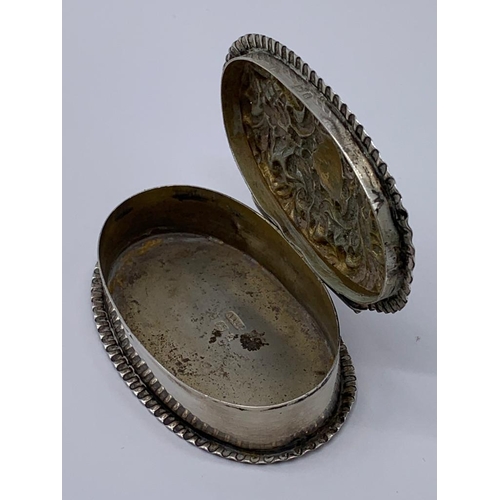 151 - Antique silver snuff box in oval repousse form. Hallmarked Adie & Lovekin, Birmingham 1900.  Lid fit... 