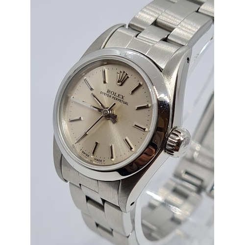 17 - Rolex Oyster Perpetual ladies watch, Molly 24-3-89. Beige face with white metal strap and sapphire g... 