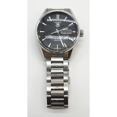 174 - Carrera Tag Heuer Calibre 5 automatic gents watch with black face and white metal strap and skeleton... 