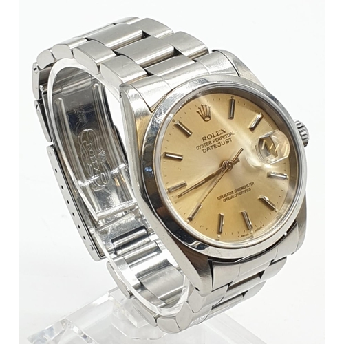 39 - Rolex Oyster perpetual datejust gents watch 1993 with gold face and steel strap, 36mm case. In worki... 