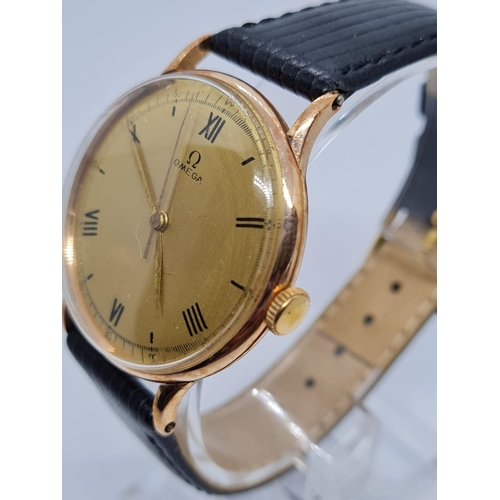 74 - Rose Gold vintage Omega gents watch with black leather strap. 32mm case.