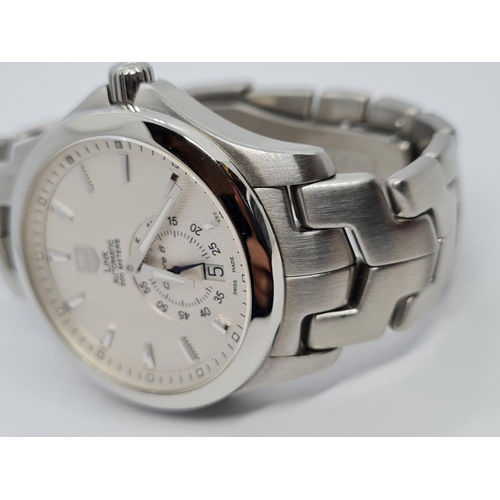 89 - Tag Heuer link automatic gents watch calibre 6 with off white face and skeleton back, 38mm case.