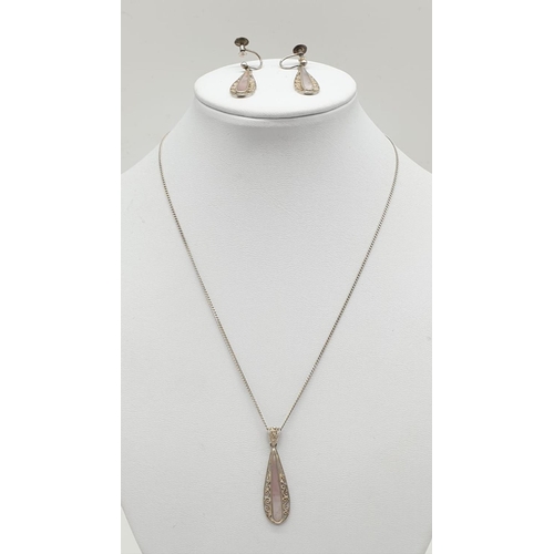 895 - Silver jewellery set to include pendant on chain and matching pair of earrings. 
Mother of pearl des... 