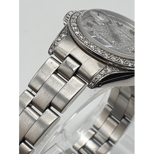 83 - Rolex datejust ladies watch with diamond encrusted face and bezel, 26mm face.