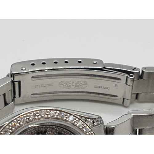 83 - Rolex datejust ladies watch with diamond encrusted face and bezel, 26mm face.