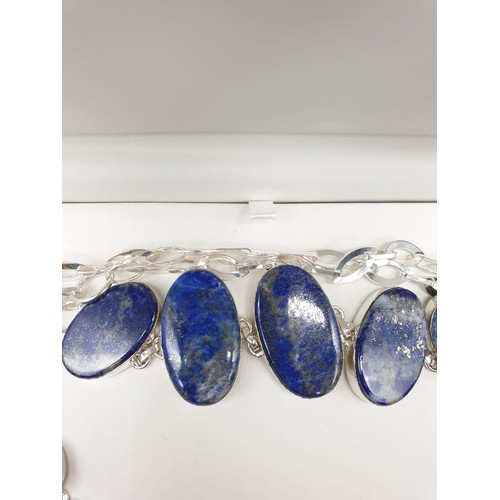 130 - A lapis lazuli necklace and bracelet set is a presentation box. Necklace length: 50-54cm, bracelet l... 