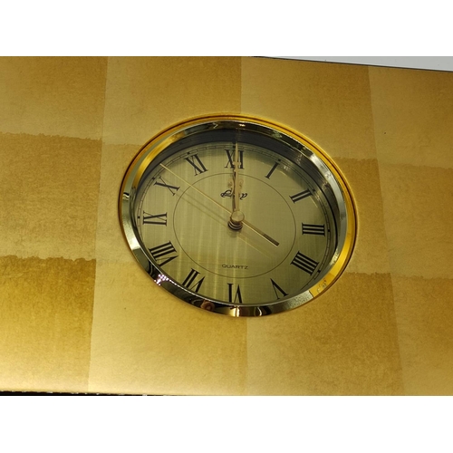 103 - A Japanese Hakuichi Gold-Leaf Folding Clock. unused, New in Box.