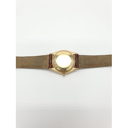 45 - Vintage 18ct Rolex oyster perpetual gents watch with gold case and leather strap, automatic and 36mm... 