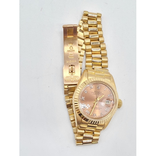 55 - 18ct gold Rolex oyster perpetual Datejust ladies watch with rose gold face and Roman numerals, 20mm ... 