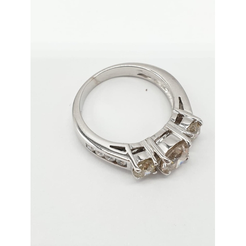 58 - 18ct white gold ring with 1.16ct diamond centre (colour K, clarity VS1) and 2 diamonds on the sides ... 