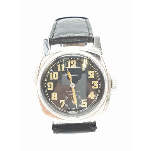 64 - Longines vintage gents watch (antimagnetic, manual wind), case 42mm with black leather strap, in wor... 