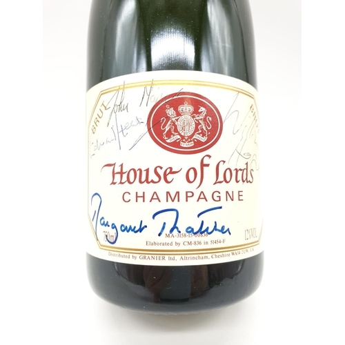 8 - An extremely rare piece. A bottle of House of Lords Champagne signed by 3 Prime Ministers: Margaret ... 