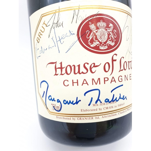 8 - An extremely rare piece. A bottle of House of Lords Champagne signed by 3 Prime Ministers: Margaret ... 