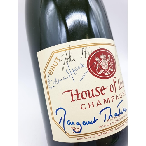 8 - An extremely rare piece. A bottle of House of Lords Champagne signed by 3 Prime Ministers: Margaret ... 