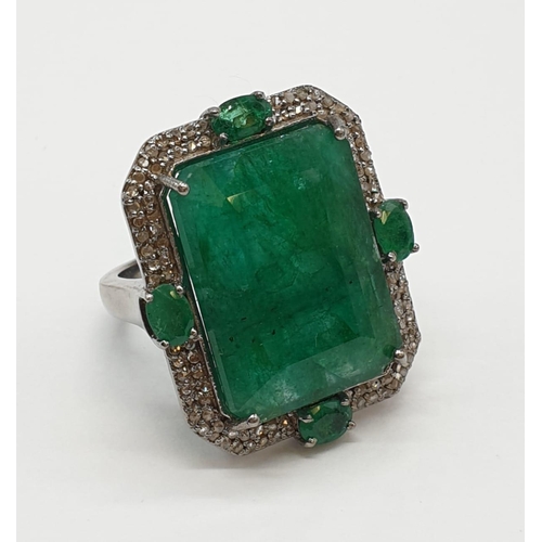 128 - Emerald M size silver ring with 23.50ct emerald and 0.8ct rose cut diamonds