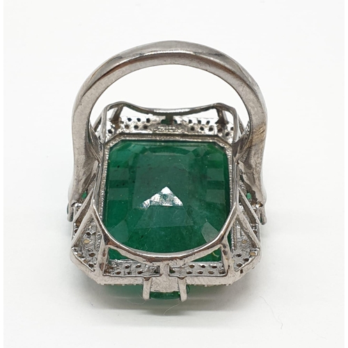 128 - Emerald M size silver ring with 23.50ct emerald and 0.8ct rose cut diamonds