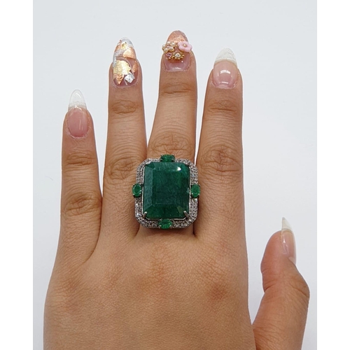 128 - Emerald M size silver ring with 23.50ct emerald and 0.8ct rose cut diamonds