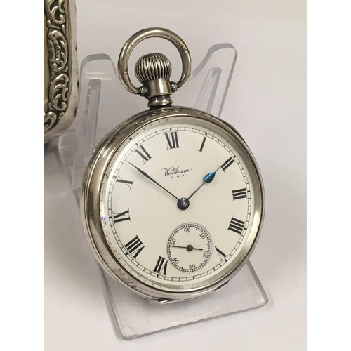 38 - Antique sterling silver Waltham pocket watch & silver stand , good condition and good working order ... 