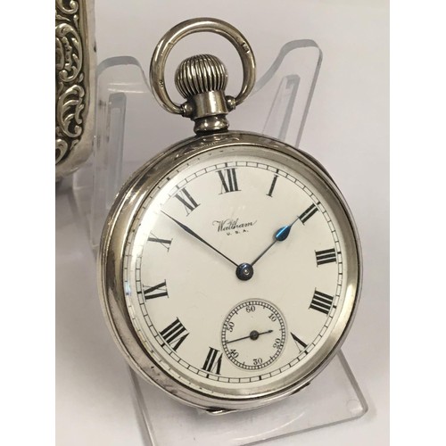 38 - Antique sterling silver Waltham pocket watch & silver stand , good condition and good working order ... 