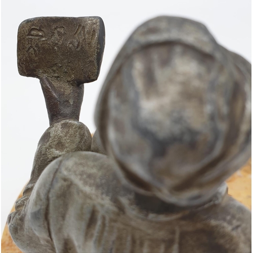 44 - Ashtray of a Moroccan preacher man figurine on a marble base. Height 11cm.