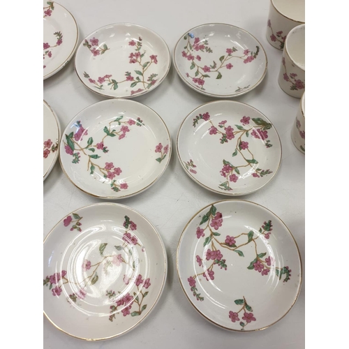 89 - Vintage Children's China Tea Set featuring 6 cups, 6 saucers, 6 plates, sugar bowl and teapot. Prett... 