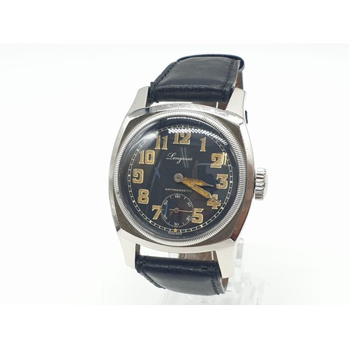 64 - Longines vintage gents watch (antimagnetic, manual wind), case 42mm with black leather strap, in wor... 