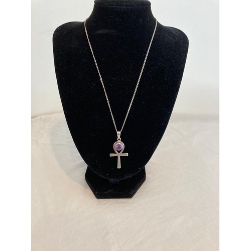 805 - Silver Celtic cross  set with large circular amethyst mounted on silver chain. Silver chain 45 cm ap... 