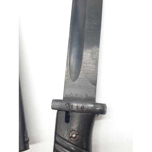 21 - WW2 German Mauser K-98 Bayonet dated 1943 in a 1940 dated scabbard. Over all very good condition wit... 