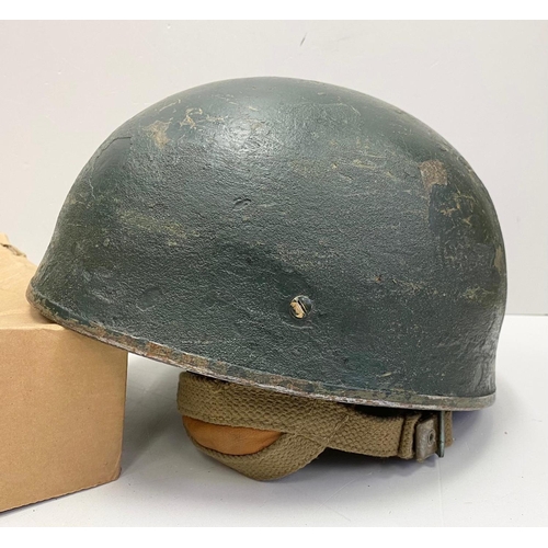 26 - WW2 British Para Helmet. Late War type with original canvas chin strap. The liner is WW2 design but ... 