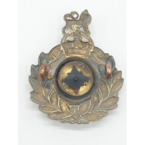 74 - WW2 Royal Marine Cap Badge with hidden escape compass.