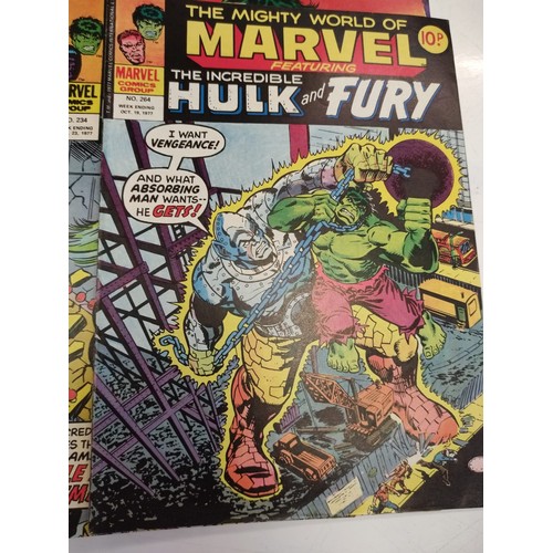 197 - 12 The mighty world of Marvel featuring The incredible Hulk & comics. All from 1976-78. Three mighty... 