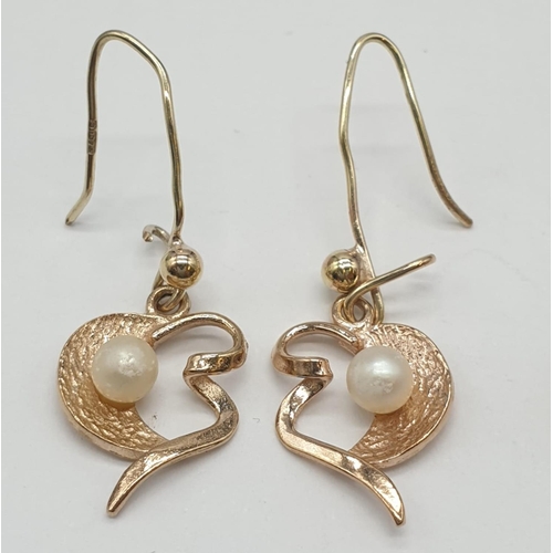 149 - 10.2g of 9ct gold consisting of 8 items to include: 4 pairs of earrings. 2 rings, 1 heart pendant an... 