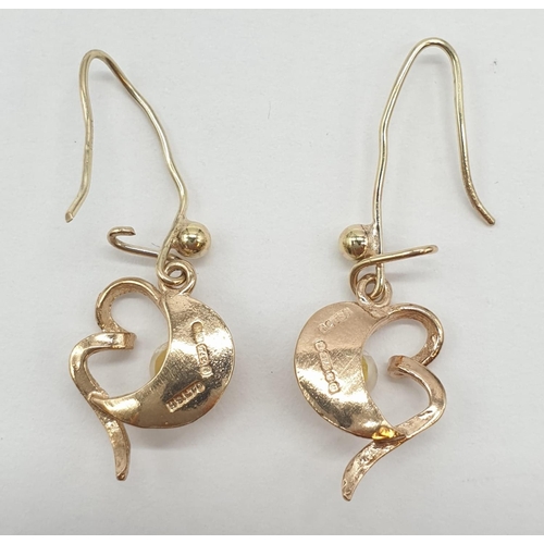 149 - 10.2g of 9ct gold consisting of 8 items to include: 4 pairs of earrings. 2 rings, 1 heart pendant an... 