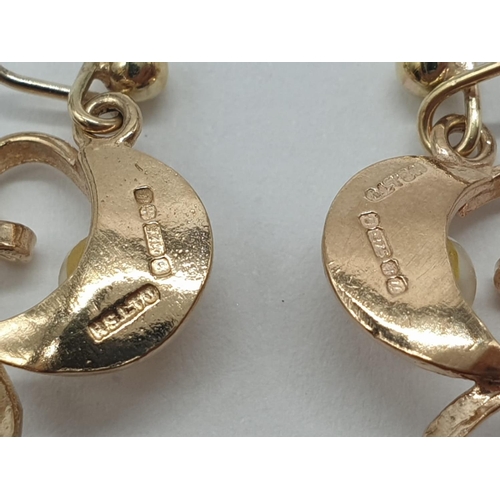 149 - 10.2g of 9ct gold consisting of 8 items to include: 4 pairs of earrings. 2 rings, 1 heart pendant an... 