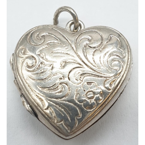 153 - 3x silver brooches and a heart shaped locket 18.5g