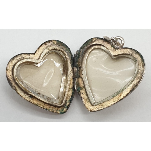 153 - 3x silver brooches and a heart shaped locket 18.5g