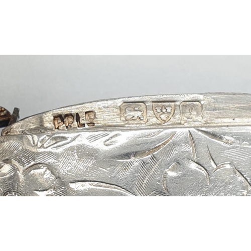 154 - A vintage silver decorated vesta case 24.5g